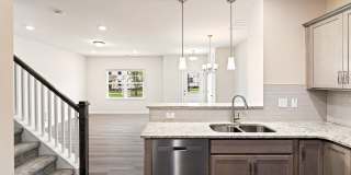 Like-New Townhome Walk to Downtown | Garage + Internet Included Gallery 7