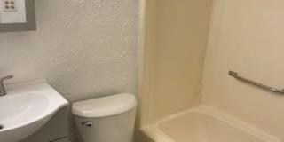 1 bed downstairs unit with courtyard, laundry access,brand new appliances, paint and flooring, includes all utilities up to 200 monthly Gallery 5