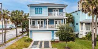 Luxury Beachside Living with Ocean Views & Private Elevator. 4 Bed/3.5 Bath With 2 Car Garage. Pet Friendly! Gallery 1