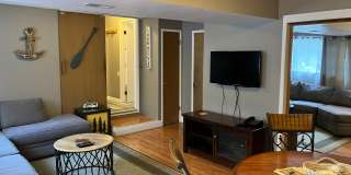 Furnished rental with large fenced back yard. Gallery 19