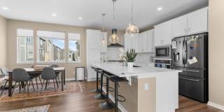 Stunning 2-Bedroom, 3-Bathroom Townhome with Rooftop Deck and Mountain Views Gallery 1
