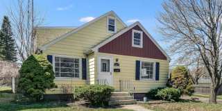 Elegant 4-bedroom Home with Chef’s Kitchen, 2 Full Bath, and Two-Car Garage Gallery 1