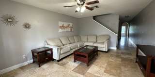 Beautiful Townhome in a gated community with assigned parking spots and a community pool Gallery 3