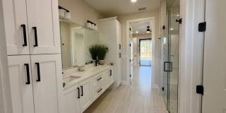 Brand-New Waterfront Luxury in Cape Coral | Heated Pool, Spa, Outdoor Kitchen & 3-Car Garage Gallery 16