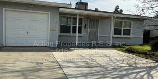 Close to Freeway, Shopping Single Story 2 Bedroom 1 Bath Large yard 1 Car Garage Drought Resistant Front Yard Gallery 1