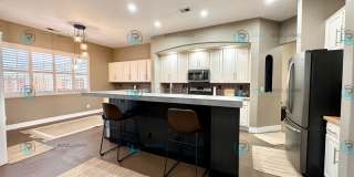 Open Kitchen, Expansive Living, and Covered Patio in Tranquil South Reno Near Trails, Parks & Shopping Gallery 4