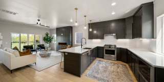 Discover modern elegance in the newly constructed Edgewater Condominiums, a boutique community featuring 18 luxurious units with 9 still available for purchase. Gallery 12