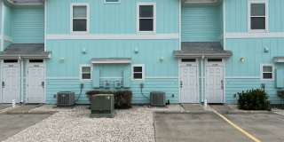 FULLY FURNISHED ISLAND TOWNHOME WITH SOME BILLS PAID Gallery 1