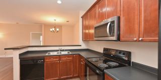 **PRISTINE GARDEN-LEVEL CONDO ON THE FIRST LEVEL NEAR PAVILION AND COMMUNITY GREEN SPACE** Gallery 15