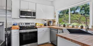 Furnished Upgraded 2-bed, 2-bath Private End-Unit with Immersive Nature Views Furnished Upgraded 2-bed, 2-bath Private End-Unit with Immersive Nature Views Gallery 1
