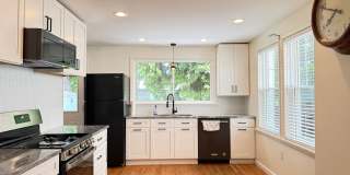Newly Renovated 3-Bedroom, 1-Bathroom End-Row Townhome with Bonus Room & Backyard! Gallery 1