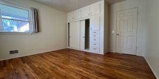 Bi-Level House w/ Massive Backyard, Storage, & Character! Gallery 14
