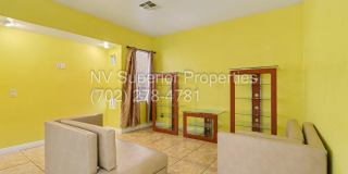 NW!! 4 Bedrooms!!! All Tile and Pergo flooring T/O!! NO Carpet!!! Low Maintenance Desert landscaping front and back!! With Patio cover in back!!! Gallery 13