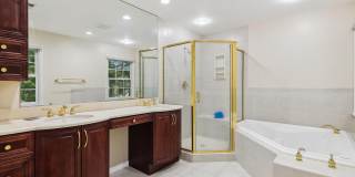 5 BR 4.5 BA home with inground heated pool and extensive hardscape! Gallery 36