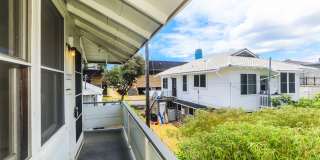 Waiola - upstairs 1 bedroom with 1 parking - window air conditioner in bedroom.. Gallery 18