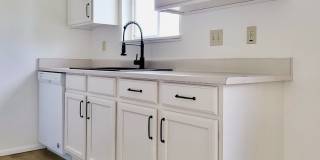 Newly Renovated Farmhouse style unit with new mini split for heating and cooling and garage Gallery 1