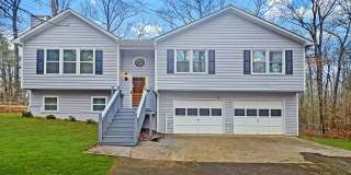 Charming 4BR/3BA Split-Level Retreat on a Secluded Wooded Lot in Hiram Gallery 1