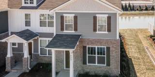 **BE THE LUCKY ONE TO LIVE IN THIS 2022-BUILT END-UNIT TOWNHOME IN BLACKMAN STATION** Gallery 1