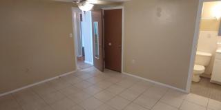 BEAUTIFUL 2/2/1 1000 Sq. Ft. with a large open floorplan, fenced yard and an enclosed lanai!! Gallery 8