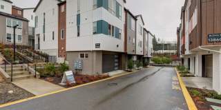 Live Where Style Meets Convenience – 2BR Townhome + Garage Gallery 1