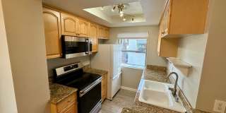 Beautiful 2 BD, 1.5 BA condo w/1 car detached garage for rent in University Heights! Gallery 1