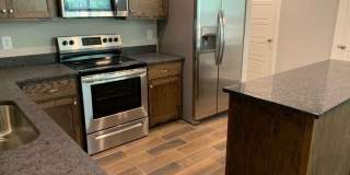 Convenient 3BR/2BA Townhome with Garage & Lawn Care Included Gallery 5