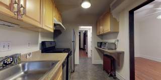 Large 4 Bedroom, 2 Bath House with Hardwood floors, walk in closets and more! Gallery 11