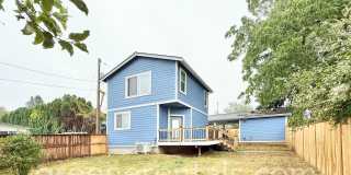 Modern 1-Bedroom Home with Yard, Deck & Carport Gallery 1