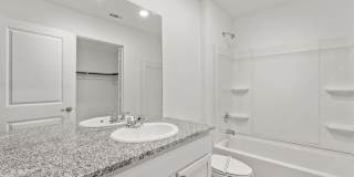This beautiful single-story home has 4 bedrooms, 2 baths, vinyl flooring throughout, an open floor plan Gallery 15