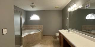 Spacious 4-Bedroom Home with Fenced Backyard, Deck, and 2-Car Garage Gallery 8