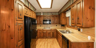Two Bedroom, 2 Bath, 1-Car Garage, 1179 sq ft feet home with wood burning fireplace. and screened porch. Gallery 12