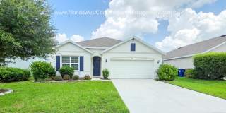MOVE IN READY ! 4 BEDROOM/2 BATH! TILE- LVP THROUGHOUT! LAWN MOWING INCLUDED! Gallery 1