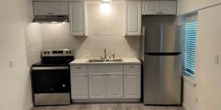 1 bed downstairs unit with courtyard, laundry access,brand new appliances, paint and flooring, includes all utilities up to 200 monthly Gallery 13