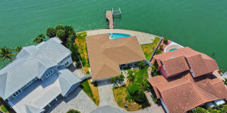 Luxury Waterfront Living in St. Pete Beach with Private Pool & Spa - 4 Bed | 3 Bath Gallery 1