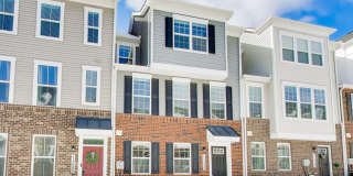 Welcome to this beautifully designed 3 level townhome in Westphalia Town Center Community! Gallery 36