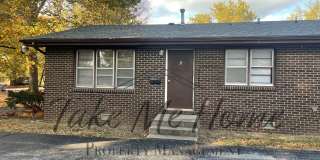 Charming 2-Bed, 1-Bath Home for Rent in All-Brick Fourplex Gallery 1