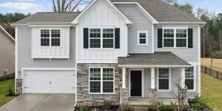 Rare 2023-built home on an oversized 0.35-acre lot in one of Waxhaw's most sought-after communities — zoned for the 9/10-rated Waxhaw Elementary School and move-in ready today. Gallery 1