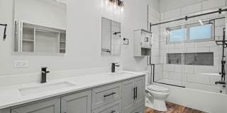 Updated 4BR Corner Lot Home with Finished Basement & 2-Car Garage Gallery 17