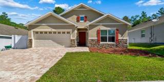 Welcome to this beautiful Florida Contemporary home located in the Country Club Village in Deland. Gallery 1