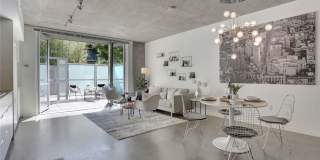 Unique 1 bed/1bath, 200 sqft patio, 2 parking spaces, high end finishes. Gallery 1