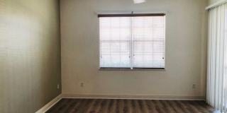 Experience Bell Tower Park. GATED ground floor 2 Bed 2 Bath Den 1 Car Garage Condo. Gallery 42