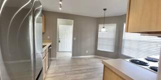Welcome Home! Updated flooring & fresh interior paint! Move in OCTOBER! Beautiful 3X2 with attached 2 car garage! Lawn care included! Near E50!! Gallery 14