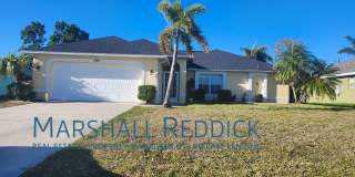 3 BED 2 BATH SINGLE FAMILY HOME ON FRESH WATER CANAL WITH DOCK Gallery 1