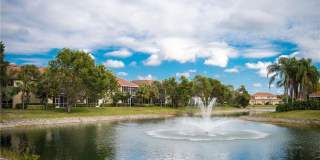 Experience Bell Tower Park. GATED ground floor 2 Bed 2 Bath Den 1 Car Garage Condo. Gallery 29