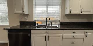 Grand 5 Bedroom Home Featuring 19ft Ceilings, Family Room & Main-Level Suite Gallery 16