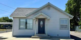 Charming 2-Bedroom Home with Patio, Storage & Plenty of Parking Gallery 1