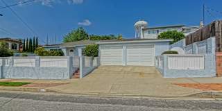 CHARMING & AIRY HOME W/ SPACIOUS FENCED YARD & LARGE 2-CAR GARAGE CLOSE TO SCHOOLS, SHOPPING & MINS TO SHOPPING & BEACH! Gallery 1