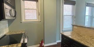 Dupont Circle 2-level Condo at The Cygnet. 1 Bed/1 Full Bath, Fireplace and Modern Kitchen Gallery 11
