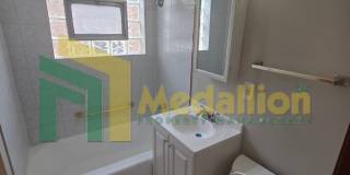 Spacious 6-Bedroom Home with Finished Basement and Backyard Gallery 12