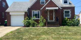 Charming 3-Bedroom Brick Cape Cod with Garage Gallery 1